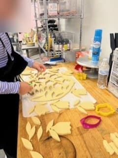Cut cookie shapes at Antonio's Macarons camp