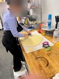 Cutting cookie dough at Antonio's Macarons camp