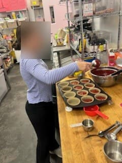 Filling tart shells at Antonio's Macarons camp